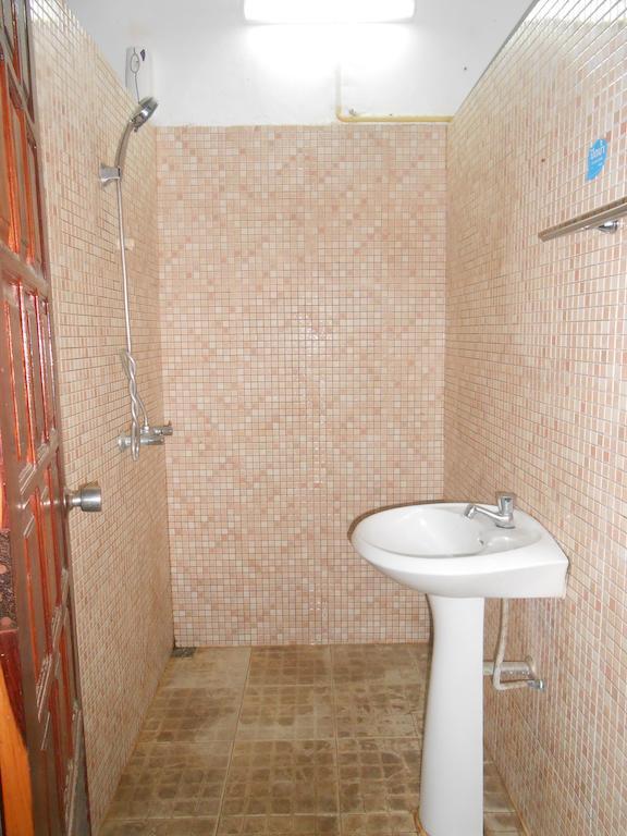 Saysouly Guesthouse Виентиане Стая снимка